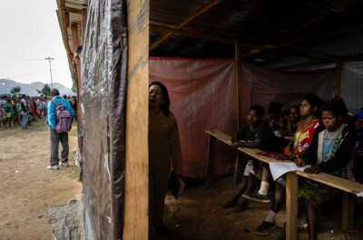 Refugees from Nduga are taught in a makeshift school in Wamena